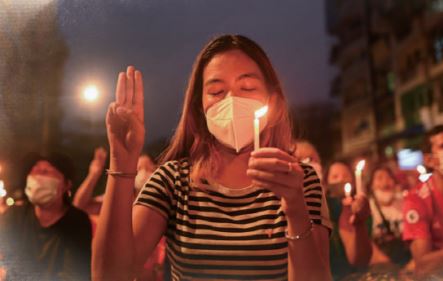 Myanmar People Holding Candles (asia.nikkei.com)