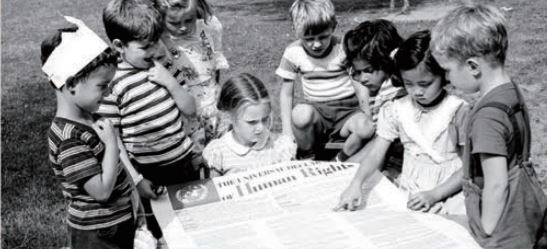 Children Reading the Universal Declaration of Human Rights (news.un.org)