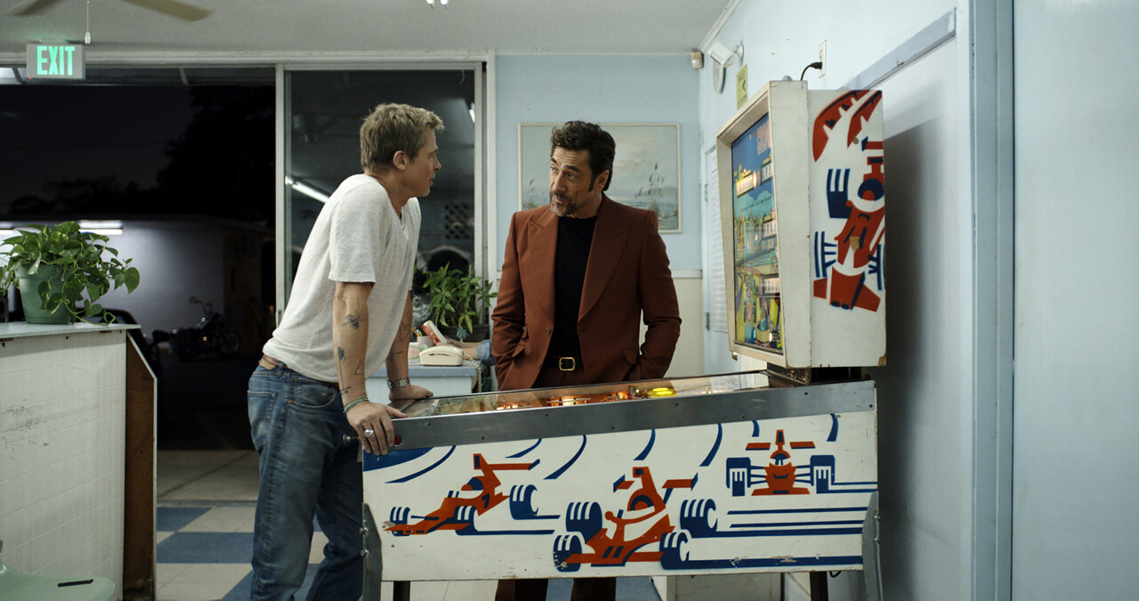 Brad Pitt as Sonny Hayes and Javier Bardem as Ruben Cervantes (Apple Original Films’ “F1 The Movie”)